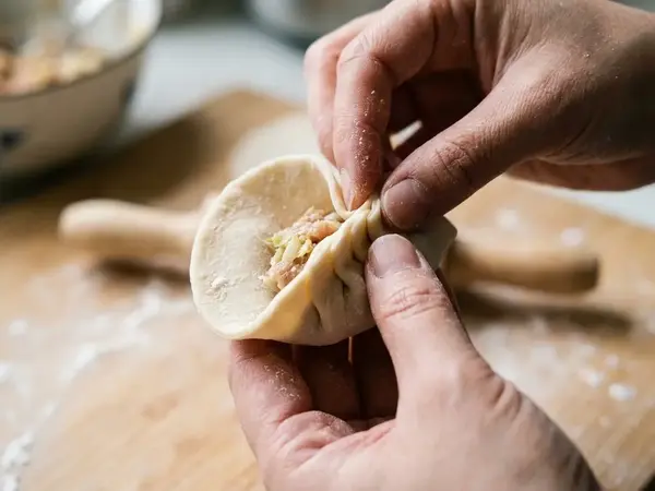 Master the Fold: A Step-by-Step Tutorial for Perfect Homemade Dumplings
